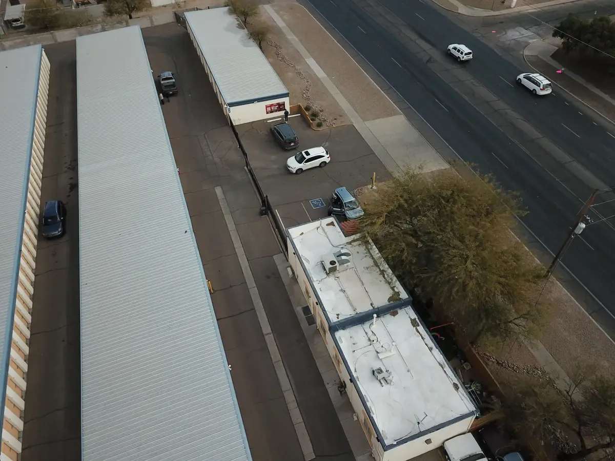 Aerial view of gate with car in front of entrance